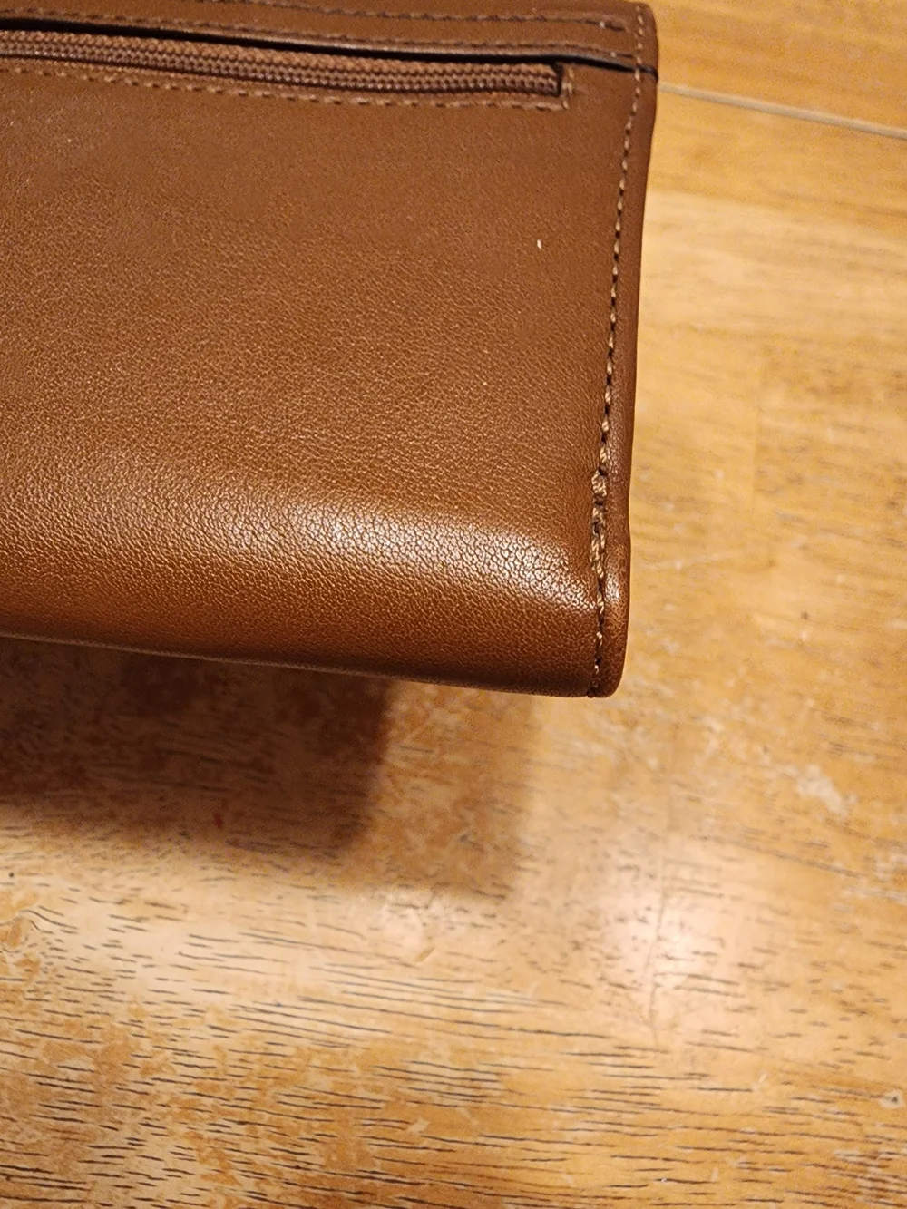 vintage Coach Soho Buckle Wallet crafted in brown leather prominent front Buckle